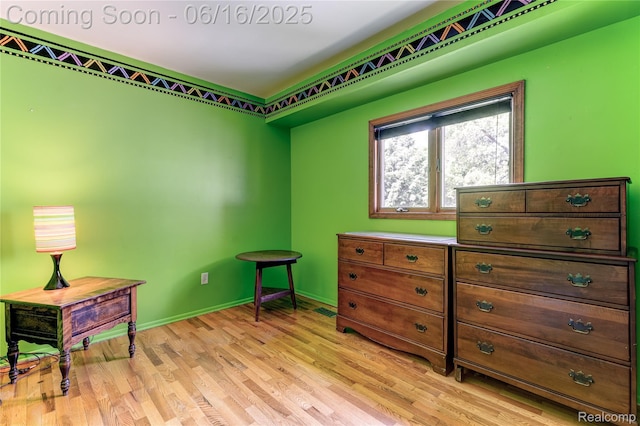 11704 Schram St, Grand Blanc, MI 48439 - sitting room with light wood-style floors and baseboards