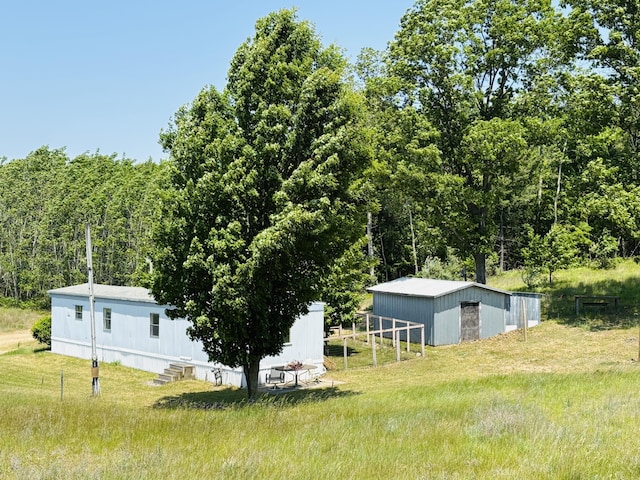 21794 30th Ave, Barryton, MI 49305 - view of yard featuring an outbuilding