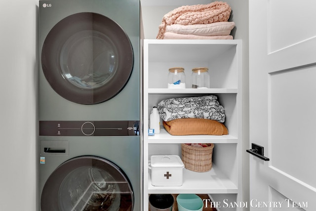 806 S Lake St, Whitehall, MI 49461 - laundry room featuring stacked washing machine and dryer