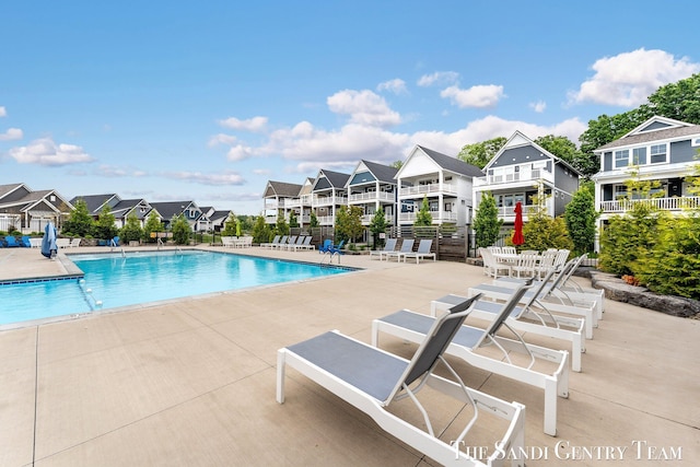 806 S Lake St, Whitehall, MI 49461 - community pool featuring a residential view and a patio