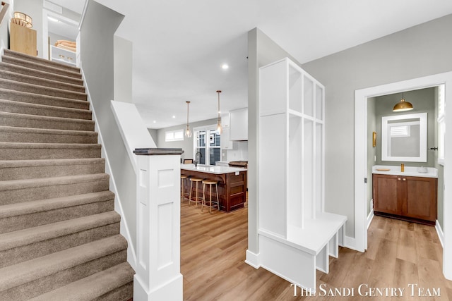 806 S Lake St, Whitehall, MI 49461 - staircase featuring wood finished floors and recessed lighting