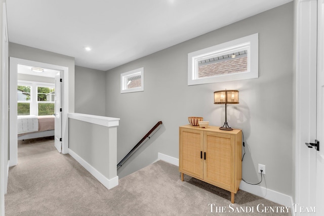 806 S Lake St, Whitehall, MI 49461 - hallway featuring an upstairs landing, light carpet, plenty of natural light, and recessed lighting