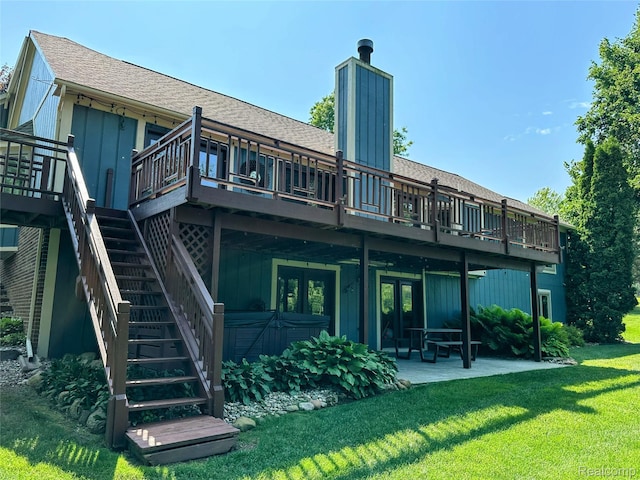 6771 Foxboro, Brighton, MI 48116 - back of house featuring a yard, a deck, a patio area, french doors, and a shingled roof