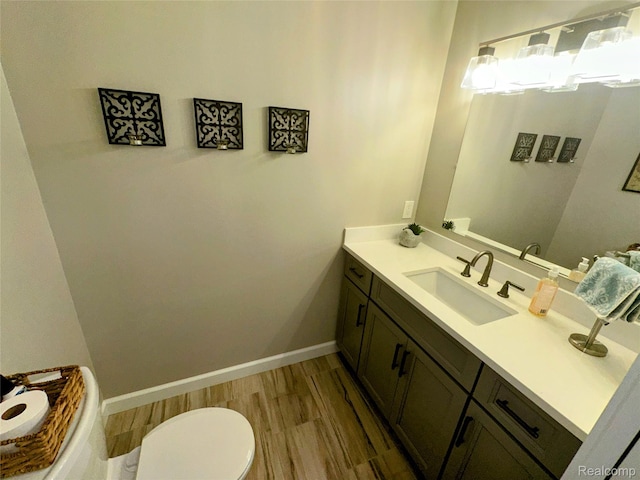 6771 Foxboro, Brighton, MI 48116 - half bathroom with vanity and wood finished floors