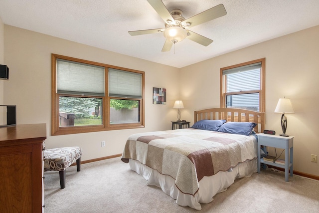 2183 Aaronsway Ct NE, Belmont, MI 49306 - bedroom with light carpet and ceiling fan