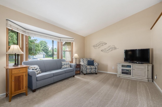 2183 Aaronsway Ct NE, Belmont, MI 49306 - living room with light colored carpet and lofted ceiling