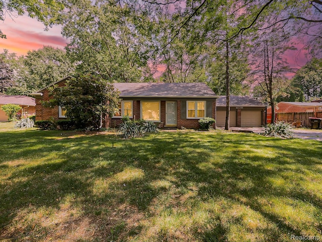 23740 Lee Baker Dr, Southfield, MI 48075 - view of front facade featuring a garage and brick siding
