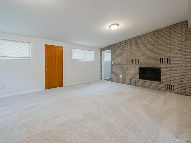 23740 Lee Baker Dr, Southfield, MI 48075 - unfurnished living room with a fireplace, carpet, and lofted ceiling