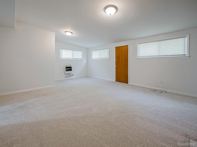 23740 Lee Baker Dr, Southfield, MI 48075 - carpeted spare room with heating unit and vaulted ceiling
