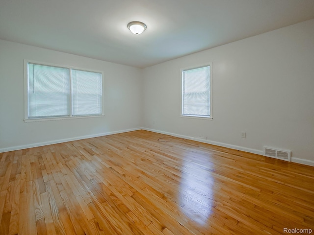 23740 Lee Baker Dr, Southfield, MI 48075 - empty room with light wood-type flooring and baseboards