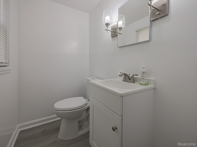 23740 Lee Baker Dr, Southfield, MI 48075 - half bathroom featuring vanity and wood finished floors