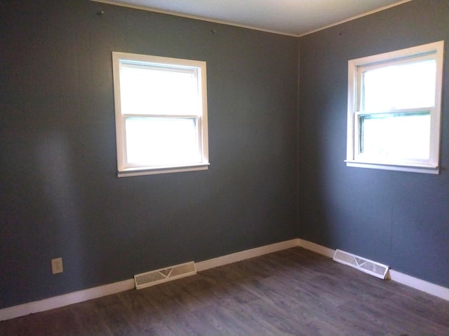1830 Ferry St, Niles, MI 49120 - spare room featuring dark wood finished floors and ornamental molding