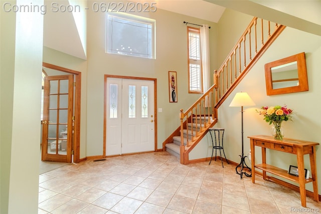 15980 Monterey St, Southgate, MI 48195 - tiled entrance foyer with stairs and a towering ceiling
