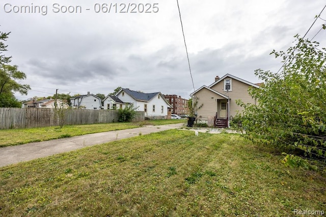 15834 Baylis St, Detroit, MI 48238 - view of yard featuring entry steps and a residential view