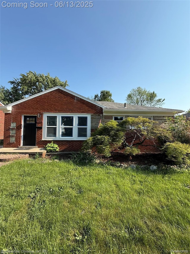 1612 Genesee Ave, Royal Oak, MI 48073 - view of front of property featuring brick siding and a front yard