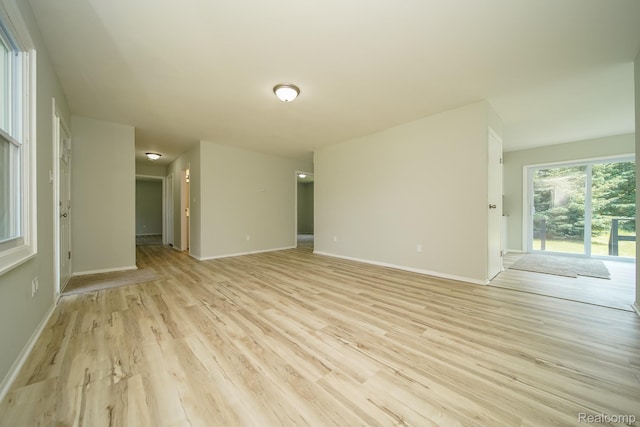 4865 Huston Dr, Lake Orion, MI 48359 - unfurnished room with light wood-type flooring and baseboards