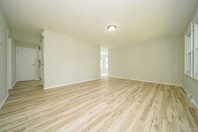 4865 Huston Dr, Lake Orion, MI 48359 - empty room with light wood-type flooring and baseboards