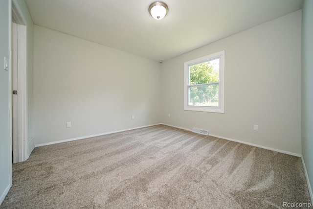 4865 Huston Dr, Lake Orion, MI 48359 - carpeted spare room featuring baseboards