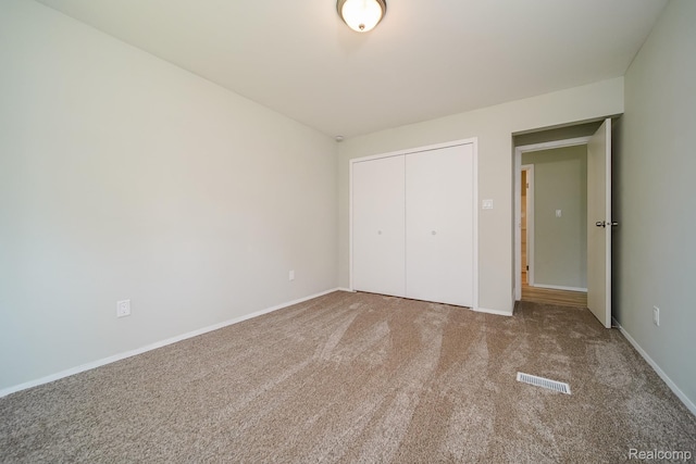 4865 Huston Dr, Lake Orion, MI 48359 - unfurnished bedroom featuring carpet floors and a closet