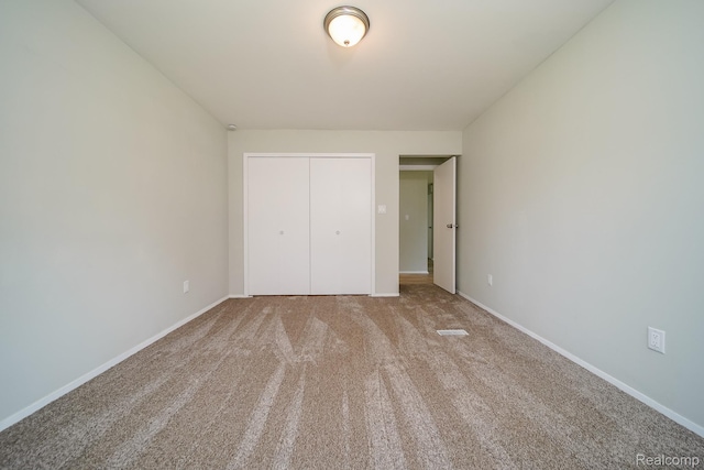 4865 Huston Dr, Lake Orion, MI 48359 - unfurnished bedroom with a closet and carpet floors
