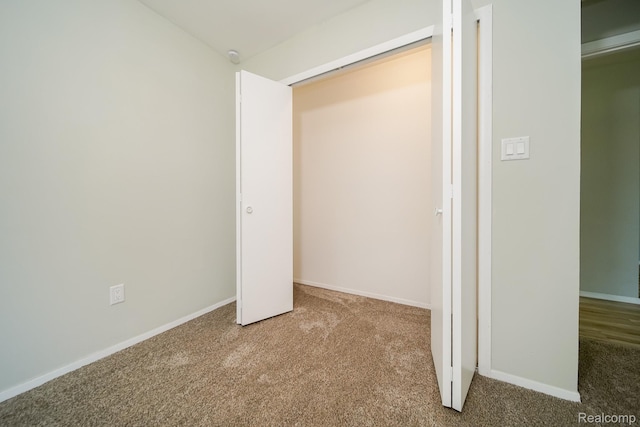4865 Huston Dr, Lake Orion, MI 48359 - unfurnished bedroom featuring carpet flooring and baseboards