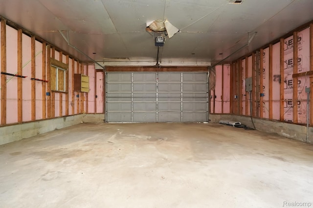 4865 Huston Dr, Lake Orion, MI 48359 - garage with a garage door opener