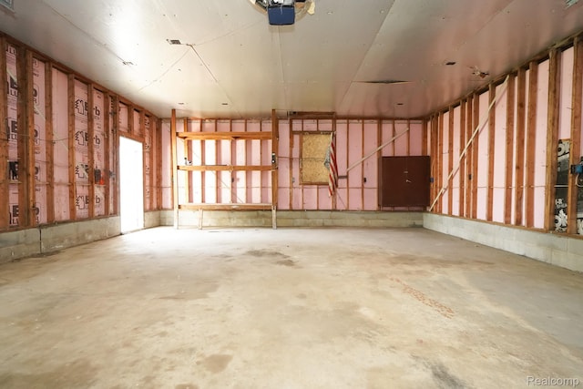4865 Huston Dr, Lake Orion, MI 48359 - garage featuring a garage door opener