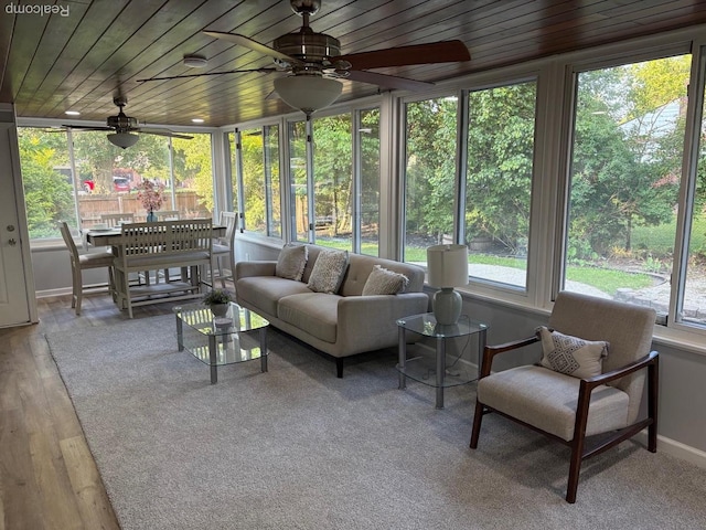 2211 Parkside St, Trenton, MI 48183 - sunroom / solarium with ceiling fan, wood finished floors, wood ceiling, an outdoor hangout area, and outdoor dining area