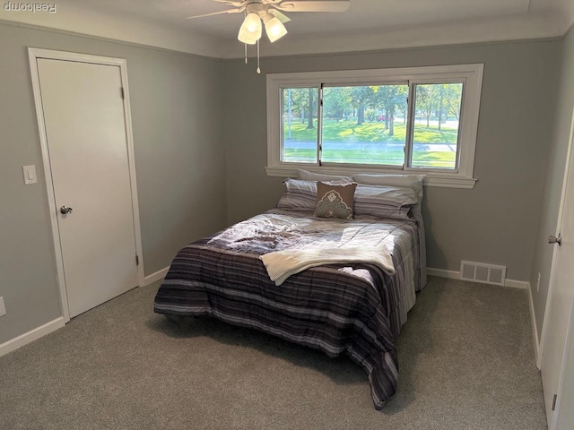 2211 Parkside St, Trenton, MI 48183 - bedroom with carpet and ceiling fan