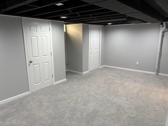 2211 Parkside St, Trenton, MI 48183 - finished below grade area featuring carpet and baseboards