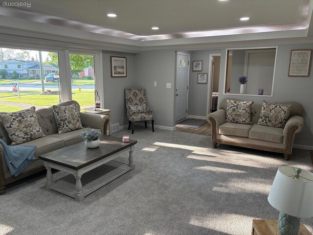 2211 Parkside St, Trenton, MI 48183 - living room featuring a raised ceiling, carpet flooring, and recessed lighting