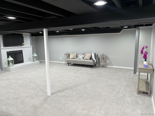 2211 Parkside St, Trenton, MI 48183 - finished basement featuring carpet floors and a fireplace