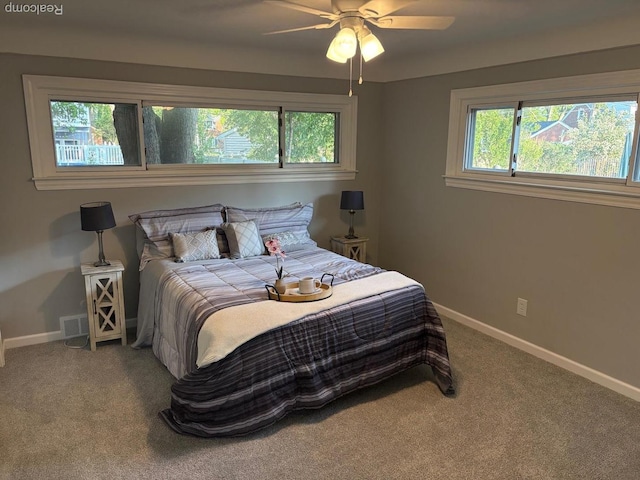 2211 Parkside St, Trenton, MI 48183 - carpeted bedroom featuring baseboards and a ceiling fan