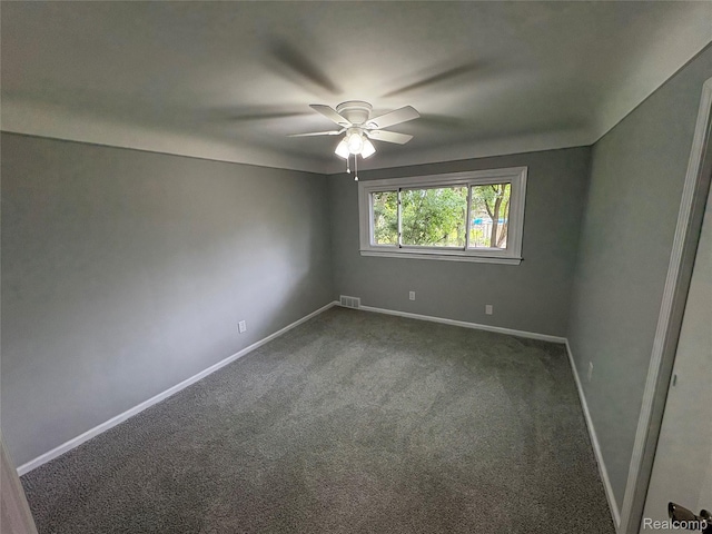 2211 Parkside St, Trenton, MI 48183 - unfurnished room featuring a ceiling fan and dark colored carpet