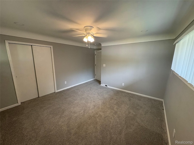 2211 Parkside St, Trenton, MI 48183 - unfurnished bedroom featuring carpet, a closet, and a ceiling fan