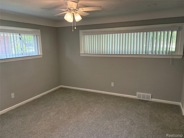 2211 Parkside St, Trenton, MI 48183 - carpeted empty room with a ceiling fan and baseboards