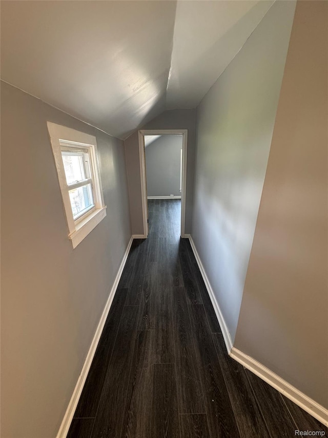 1112 Brockway Rd, Saginaw, MI 48602 - hallway with dark wood-style flooring and lofted ceiling