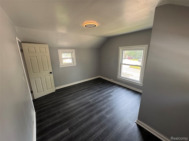 1112 Brockway Rd, Saginaw, MI 48602 - additional living space with lofted ceiling and dark wood-type flooring