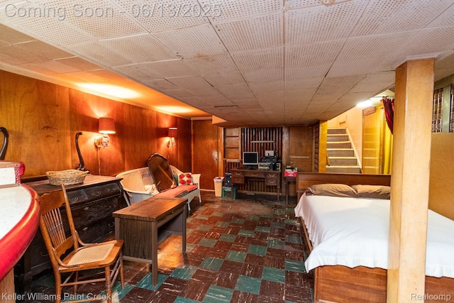 526 W Webster Rd, Royal Oak, MI 48073 - bedroom featuring wood walls and tile patterned floors