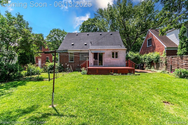 526 W Webster Rd, Royal Oak, MI 48073 - rear view of house with a deck and a shingled roof
