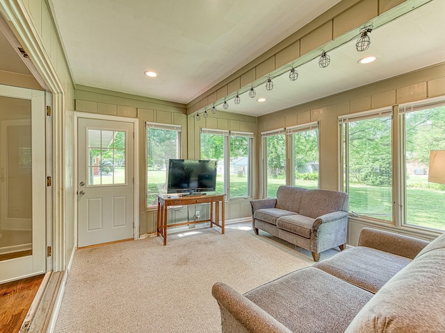 219 Park St, Tecumseh, MI 49286 - sunroom featuring track lighting and plenty of natural light