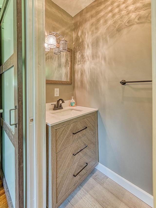 219 Park St, Tecumseh, MI 49286 - bathroom featuring vanity and baseboards