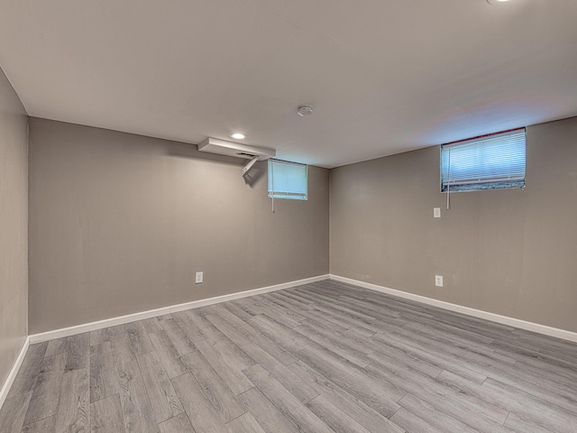 219 Park St, Tecumseh, MI 49286 - below grade area with wood finished floors and recessed lighting
