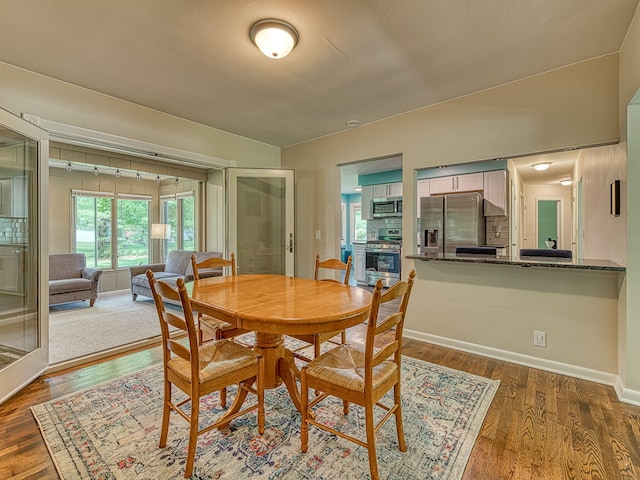 219 Park St, Tecumseh, MI 49286 - dining area with wood finished floors and baseboards