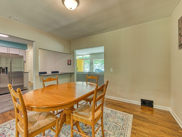 219 Park St, Tecumseh, MI 49286 - dining space featuring wood finished floors and baseboards
