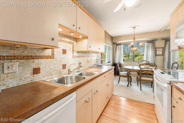 3835 Lone Pine Rd, West Bloomfield, MI 48323 - kitchen featuring white appliances, pendant lighting, backsplash, light wood-type flooring, and a ceiling fan