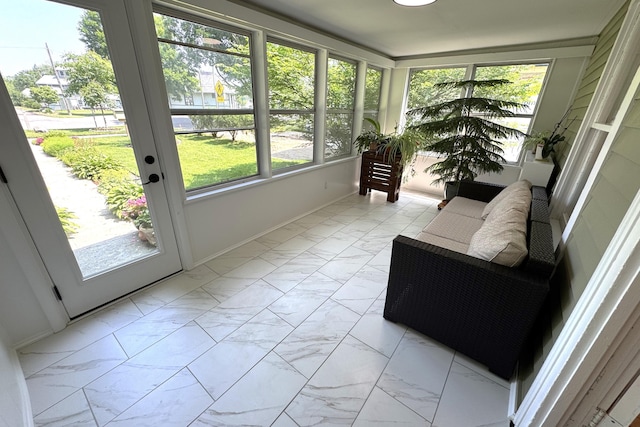 3444 Broad St, Dexter, MI 48130 - sunroom featuring marble look tiles and baseboards
