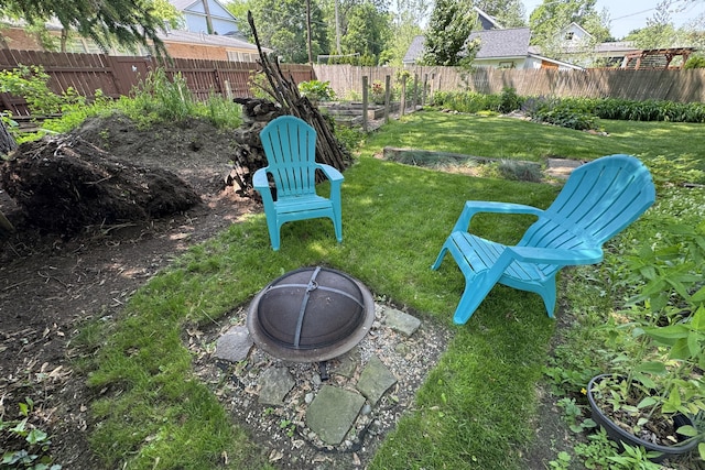3444 Broad St, Dexter, MI 48130 - fenced backyard featuring a fire pit