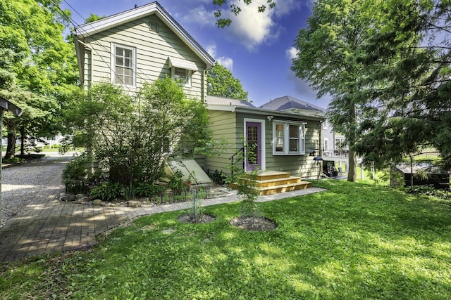 3444 Broad St, Dexter, MI 48130 - view of front of home with a front lawn