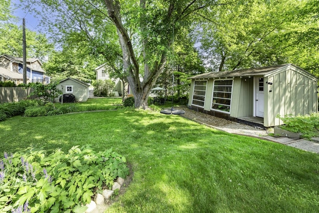 3444 Broad St, Dexter, MI 48130 - view of grassy yard featuring a storage shed